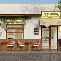 Storefront with White Wall Green Vines Outdoor Seating and Blackboard Menu Signboard