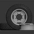 Car Tires With Deep Tread Pattern And Shiny Metal Rim On Reflective Black Surface