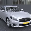 Silver Infiniti Sedan With Sleek Front Design Headlights And Grille In Outdoor Setting