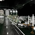 Luxurious Banquet Hall With Crystal Chandelier Reflective Floor Dining Tables Chairs And Flower Decorations
