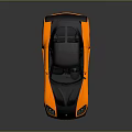 Two Tone Orange Black Sports Car With Sleek Aerodynamic Design And Rear Spoiler
