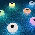 Colorful Floating Outdoor Lights with Multiple Colors Illuminating Swimming Pool Water Surface