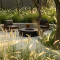 Outdoor Sofa With Fire Pit In Natural Garden Surrounded By Trees And Tall Grass