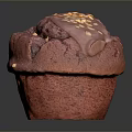 Delicious Red Cupcake With Chocolate Drizzle And Nut Sprinkles On Top