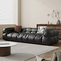 Modern Black Leather Large Sofa With Accent Pillows Round Coffee Table And Wooden Cabinet Decor