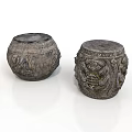 Traditional Chinese Stone Drum Stools With Intricate Carved Patterns And Vintage Design
