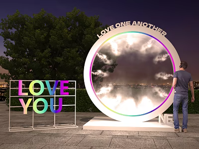 Outdoor Night Scene With Circular Love One Another Installation And Love You Sign 3d model