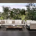 Comfortable Modern Outdoor Sofa In Natural View With Cushions Coffee Table And Green Plants