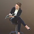 Woman In Black Blazer Reading Book While Sitting On High Stool With Brown Background