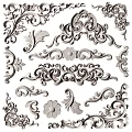 Ornate Decorative Carvings With Floral Scroll Patterns And Intricate Design Details