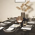 Elegant Tableware Set with Plates Wine Glasses Napkins and Dried Grass Vase on Dining Table