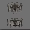 Classic Round Dining Table Set With Ornate Chairs And Floral Centerpiece