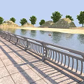 Riverside Metal Fence With Curved Railings Along Stone Pavement Trees And Small Hills