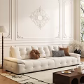 White Tufted Sofa with Plush Cushions and Coffee Table Set in Elegant Ornate Interior