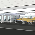 Spacious Exhibition Hall Interior Featuring Golden and Gray Fighter Jets on Display with Bright Lighting
