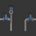 Industrial Hardware Tools Three Metal Valves With Blue Handwheels And Pipes