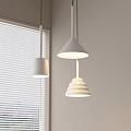 Modern Pendant Lights In Different Shapes Hanging By Window With Light Colored Wall 3d model