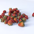 Fresh Ripe Strawberries Scattered on White Background Looking Juicy and Delicious