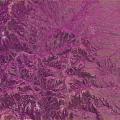 Mountainous Terrain Displaying Rugged Landforms Lush Green Vegetation And Rolling Valleys