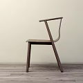 Modern Dark Wood Dining Chair With Curved Backrest Armrests Sleek Lines Light Wall Wooden Floor