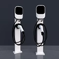 Dual Modern White Electric Vehicle Charging Stations With Black Charging Cables