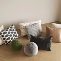 Colorful Decorative Throw Pillows With Polka Dot Checkerboard And Round Velvet Designs On Wooden Floor