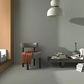 Gray Accent Chair With Armrest And Brown Coat Draped By Wooden Coffee Table With Books
