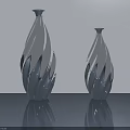 Two Silver Carved Sculpture Vases Featuring Wavy Patterns On Reflective Table 3d model