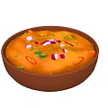 Orange Vegetable Stew in Brown Bowl with Red White Diced Veggies and Green Herbs