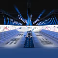 Modern Stage With Blue Lighting Hanging White Spherical Decorations Staircase Seats And Brand Logos Backdrop