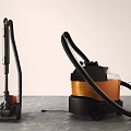 Upright And Canister Vacuum Cleaners Black Orange On Gray Floor Light Wall Background