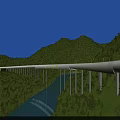Illuminated Modern Bridge With Traffic Lanes Over River In Mountainous Green Area