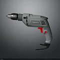 PRAXITE Handheld Electric Drill With Gray Body And Red Power Button