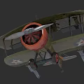 Vintage Biplane Fighter With Green Red Color Scheme And Star Insignia