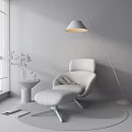 Beige Lounge Chair with Ottoman and Black Shade Floor Lamp by Window with Wooden Floor