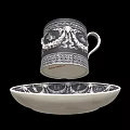 Elegant Ceramic Cup And Saucer Set With Intricate Black White Decorative Patterns 3d model