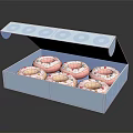 Open Blue Box Containing Six Pink Donuts With Colorful Sprinkles