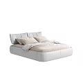 Modern White Leather Double Bed with Soft Pillows and Light Colored Bed Linens