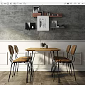 Wooden Dining Table Set With Four Chairs And Decorative Shelves On Grey Wall Interior