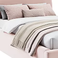 Cozy Kids Bed With Beige Curved Headboard White Quilt And Knotted Pillow