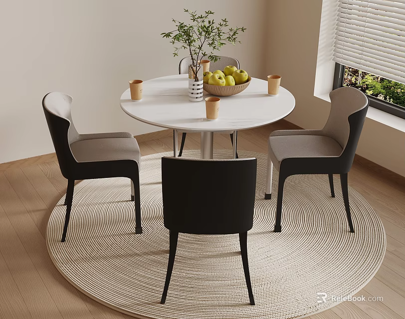 Modern Dining Space With Round White Table Black Chairs Fruit Bowl And Rug 3d model