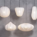 Five White Pendant Lights with Various Shapes Hanging on Gray Background 3d model