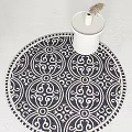 Decorative Round Area Rug Featuring Intricate White Patterns on Dark Background 3d model