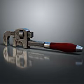 Hardware Tools Adjustable Wrench With Metal Body Red Handle And Reflective Surface 3d model