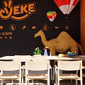 Yeke Milk Tea Shop Storefront With Fresh Drinks Display And Cozy Seating Interior