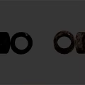 Stacked And Single Old Rubber Tires With Worn Surfaces On Gray Background