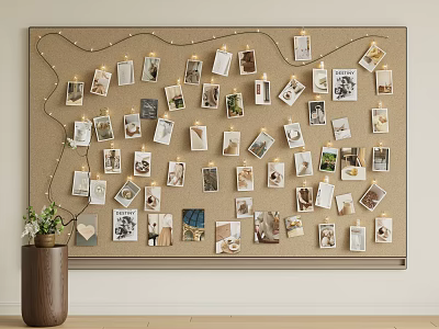 Corkboard Photo Wall Decorated with Photos Cards and String Lights Beside Vase with Green Plants 3d model