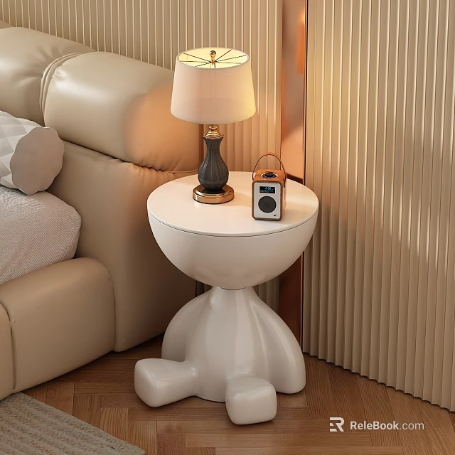 White Round Side Table with Distinctive Legs Next to Beige Sofa Holding Lamp and Radio 3d model 