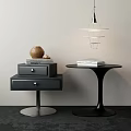 Modern Minimalist Bedside Table Interior With Black Drawers Stacked Books And Decorative Vase