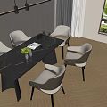 Modern Dining Table With Gray Chairs And Green Fruit Bowl In Contemporary Dining Room